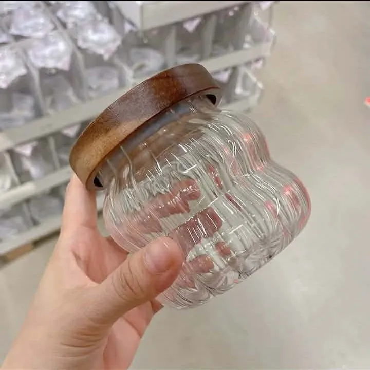 glass jar with wooden lid