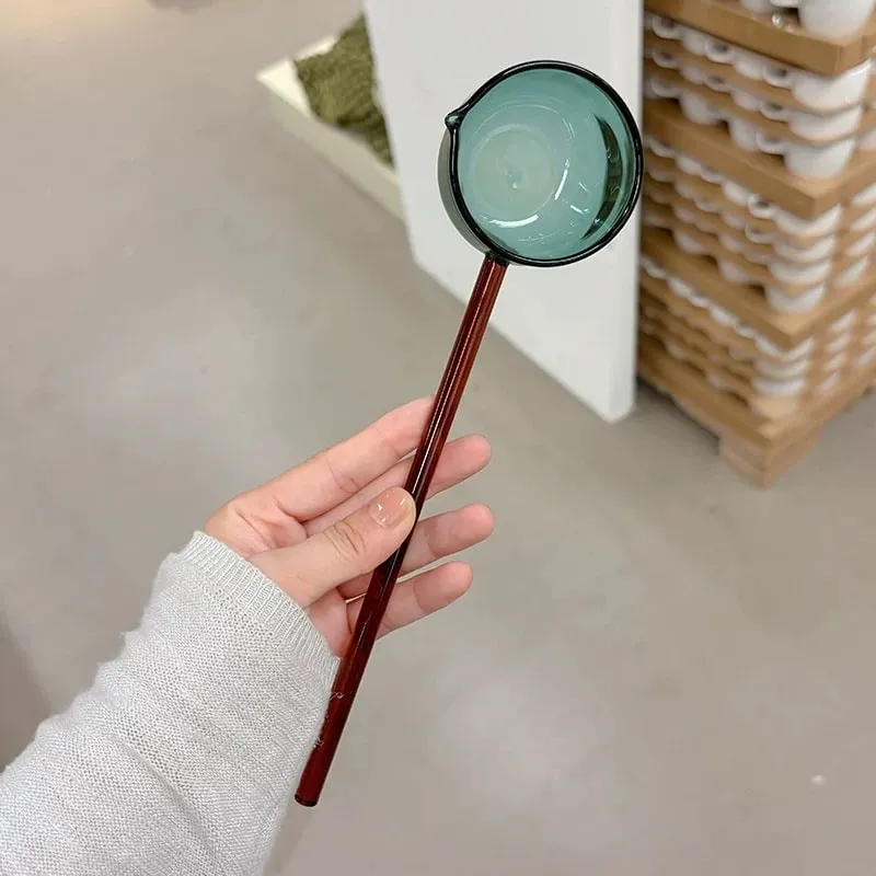 Green glass spoon